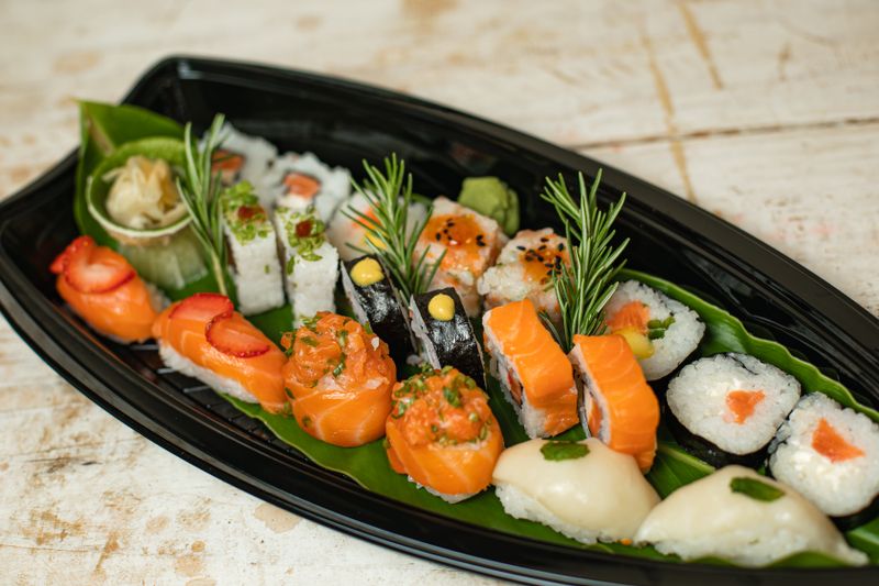 A platter of nigiri and maki sushi